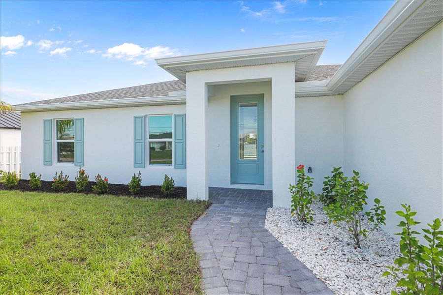 Representative exterior details of a home built from the The Sunset Harbor with Pool by Sunlife Homes LLC in Cape Coral, Cape Coral (Image 28). Representative exterior details of a home built from the The Sunset Harbor with Pool by Sunlife Homes LLC in Cape Coral, Cape Coral (Image 28).