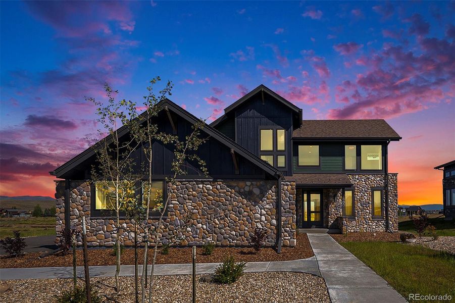 Front exterior of a new home in , Granby, CO, highlighting curb appeal (Image 14).