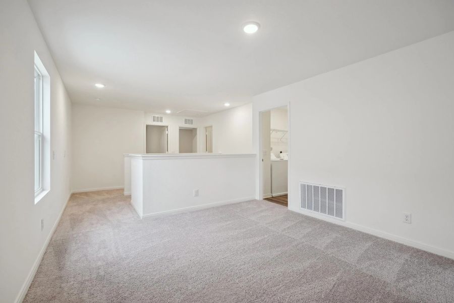 Representative unfurnished interior of a home built from the Barnard by Starlight Homes in The Wilder, Adkins (Image 16).