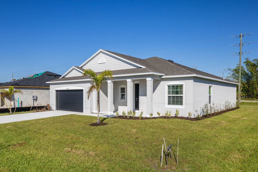 Representative exterior photo of a completed home built from the Clearwater by Maronda Homes in Vero Lake Estates, Sebastian, FL (Image 15). Representative exterior photo of a completed home built from the Clearwater by Maronda Homes in Vero Lake Estates, Sebastian, FL (Image 15).