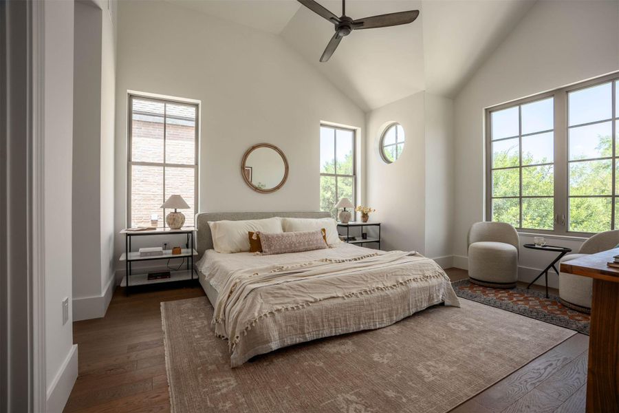 High vaulted ceilings and rich wood floors anchor this architectural bedroom retreat. High vaulted ceilings and rich wood floors anchor this architectural bedroom retreat.