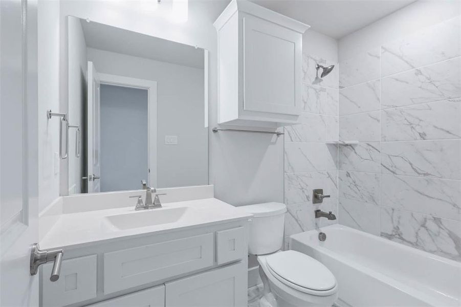 Fourth upstairs bathroom ensuite to the fifth bedroom, offering added privacy and convenience for guests or family.