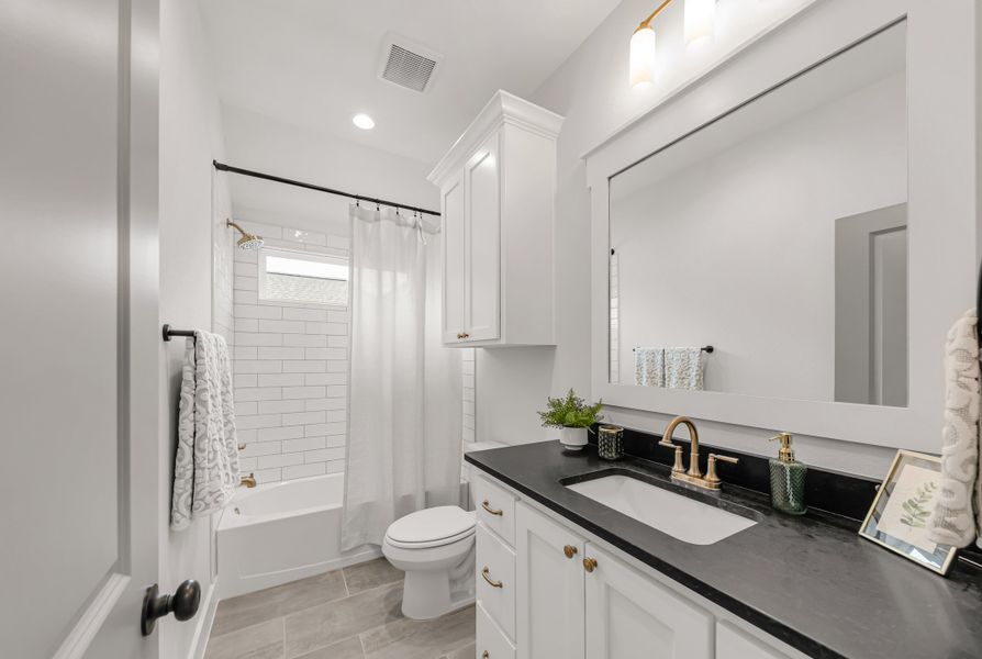 Representative furnished interior of a home built from the The Landry by Reece Homes in Oakmont, Bryan (Image 52).