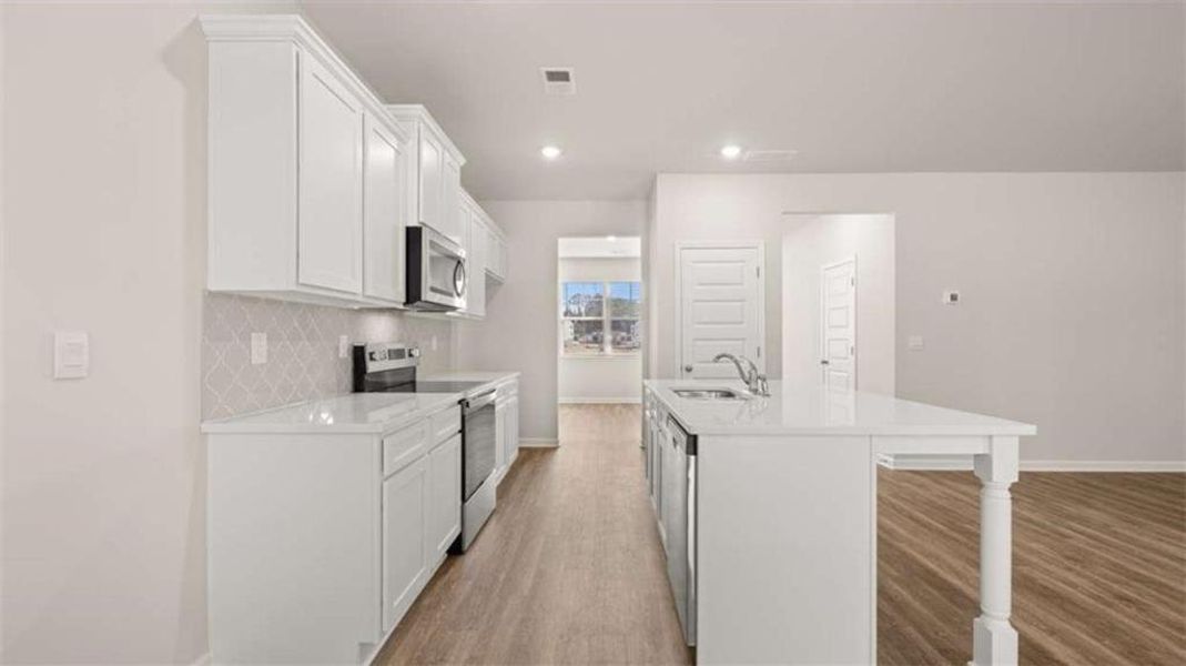 Furnished interior view inside a new home in WillowBrook, Winder (Image 9).