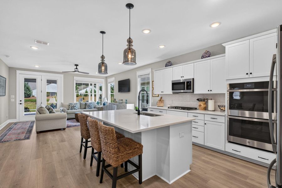 Furnished interior view inside a new home in K. Hovnanian's® Four Seasons at Lakes of Cane Bay, Summerville (Image 12).