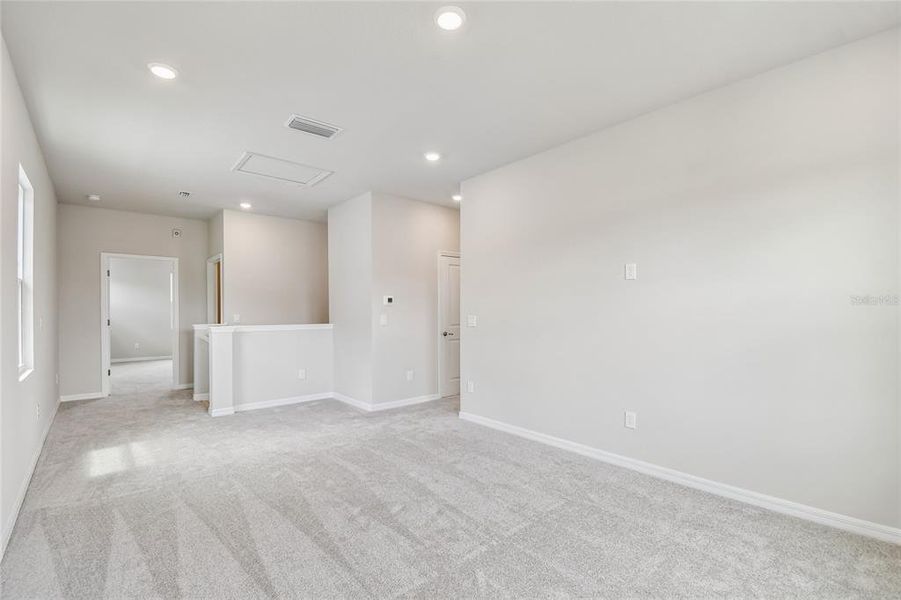 Spacious, unfurnished interior of a new home in Oakfield at Mount Dora Cottage Series, Mount Dora (Image 27).