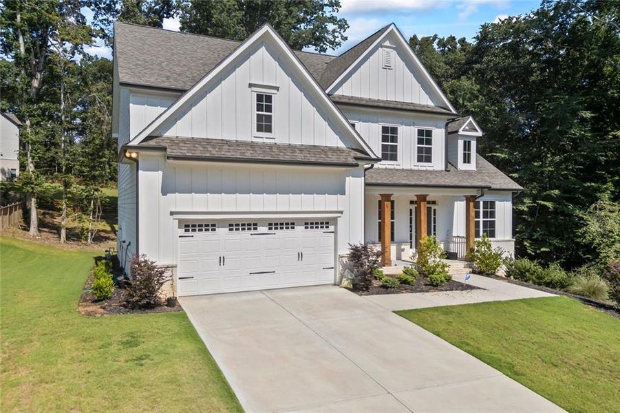 Front exterior of a new home in , Hoschton, GA, highlighting curb appeal (Image 1). Front exterior of a new home in , Hoschton, GA, highlighting curb appeal (Image 1).