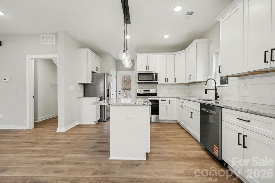 Furnished interior view inside a new home in , Gastonia (Image 6).