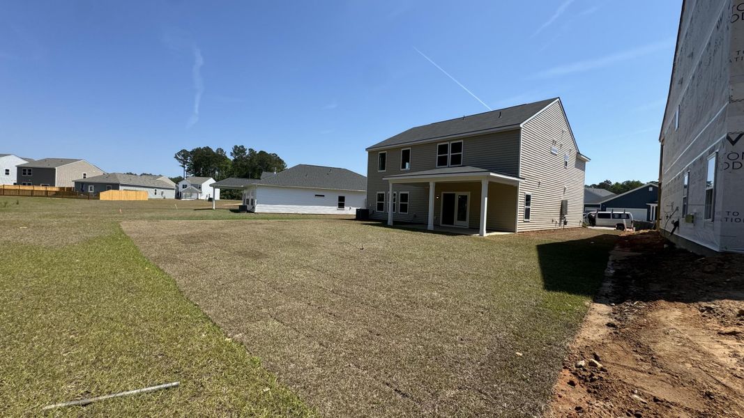 Exterior details and patio area of a home in Watson Hill, Summerville (Image 23).