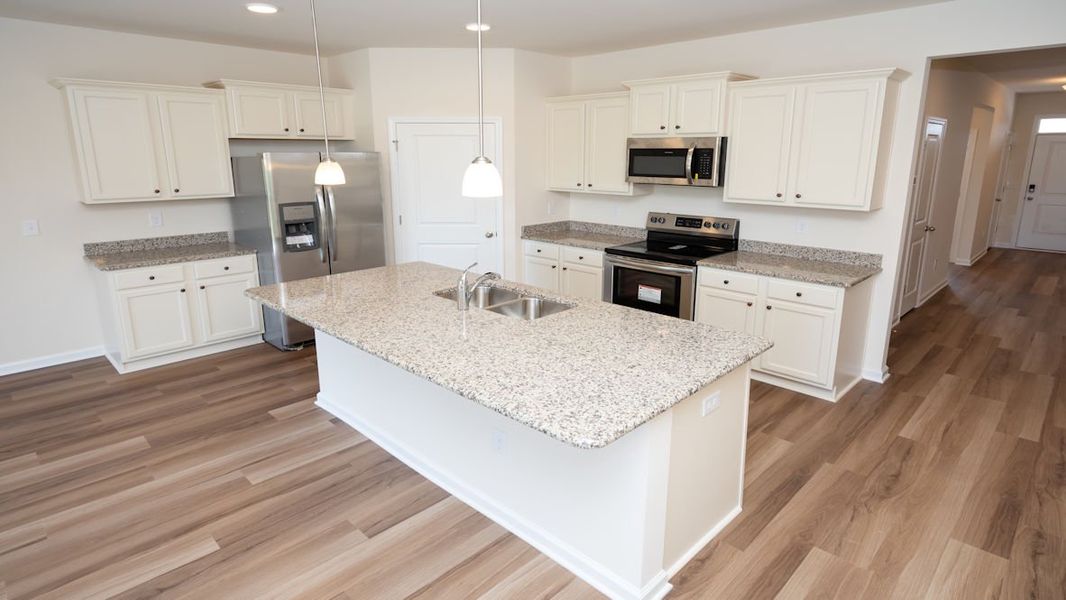 Representative furnished interior of a home built from the CALI by D.R. Horton in Lochaven, Conway (Image 8).