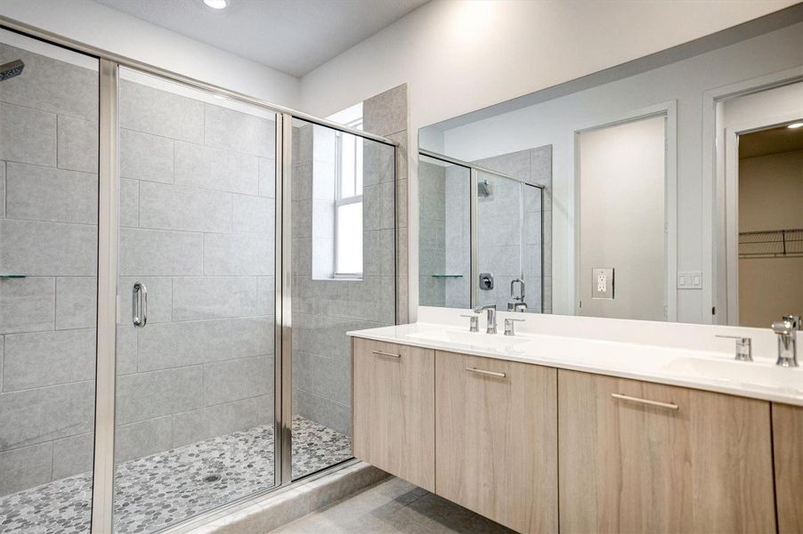 Primary Bathroom with floating cabinets