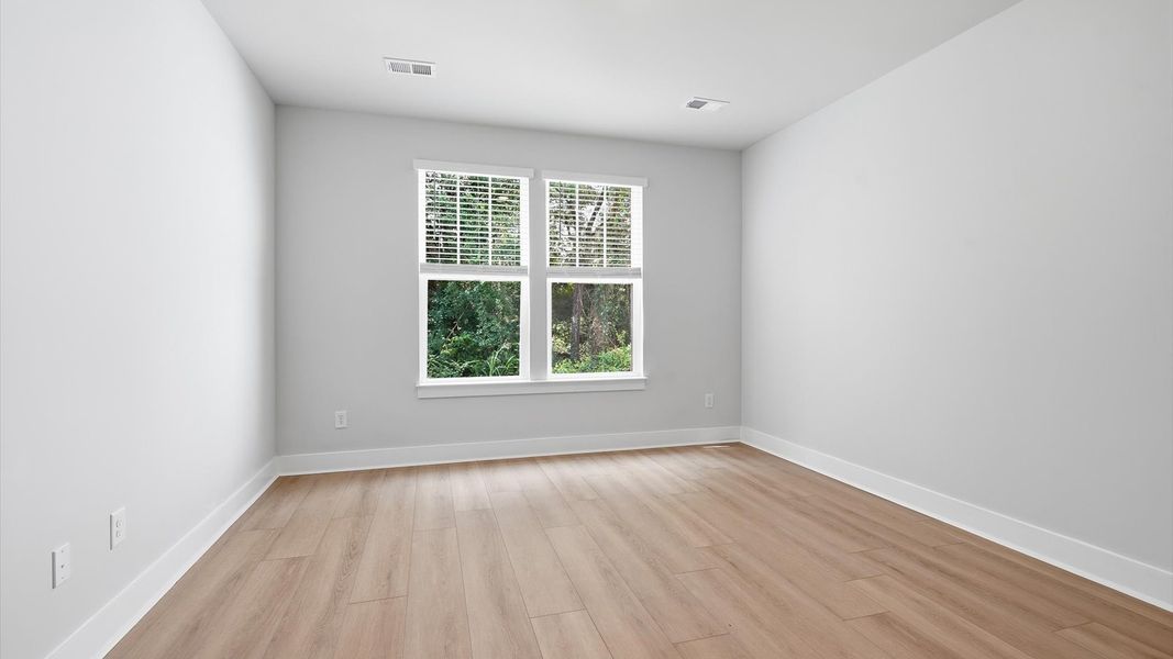 Primary suite that offers first-rate relaxation with established style and elevated finishes