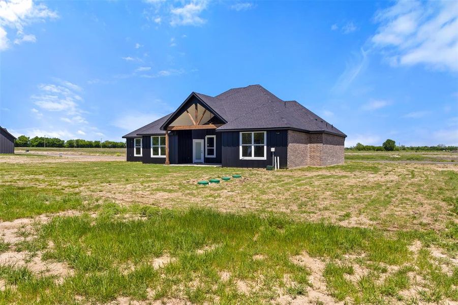 Front exterior of a new home in Briar Branch Estates, Celeste, TX, highlighting curb appeal (Image 27). Front exterior of a new home in Briar Branch Estates, Celeste, TX, highlighting curb appeal (Image 27).