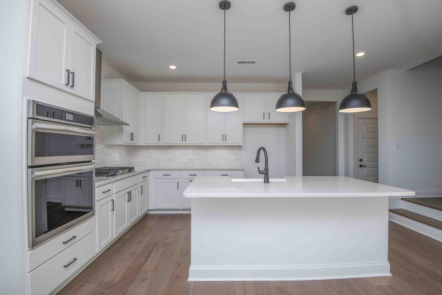 *Photo of example home. Selections and Finishes May Vary.*