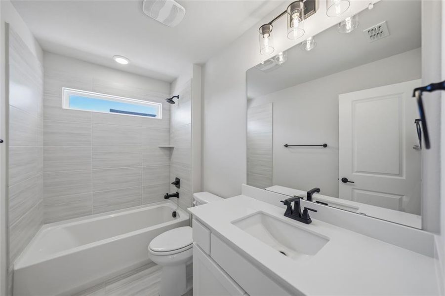 Full bath with shower / bathtub combination and vanity