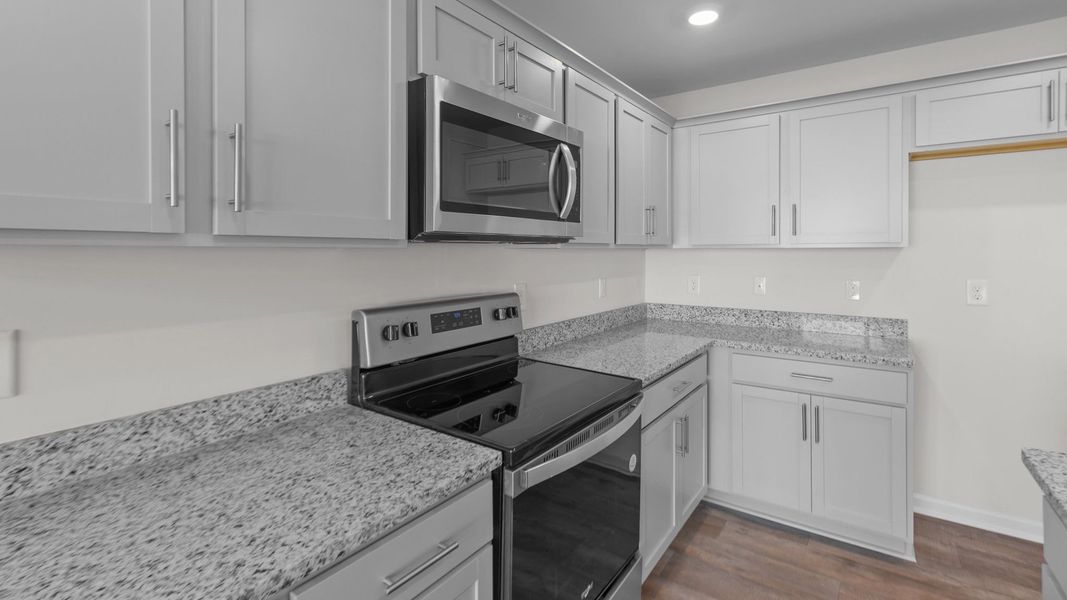 Representative furnished interior of a home built from the OLIVER by D.R. Horton in River's Edge, Mayodan (Image 5).