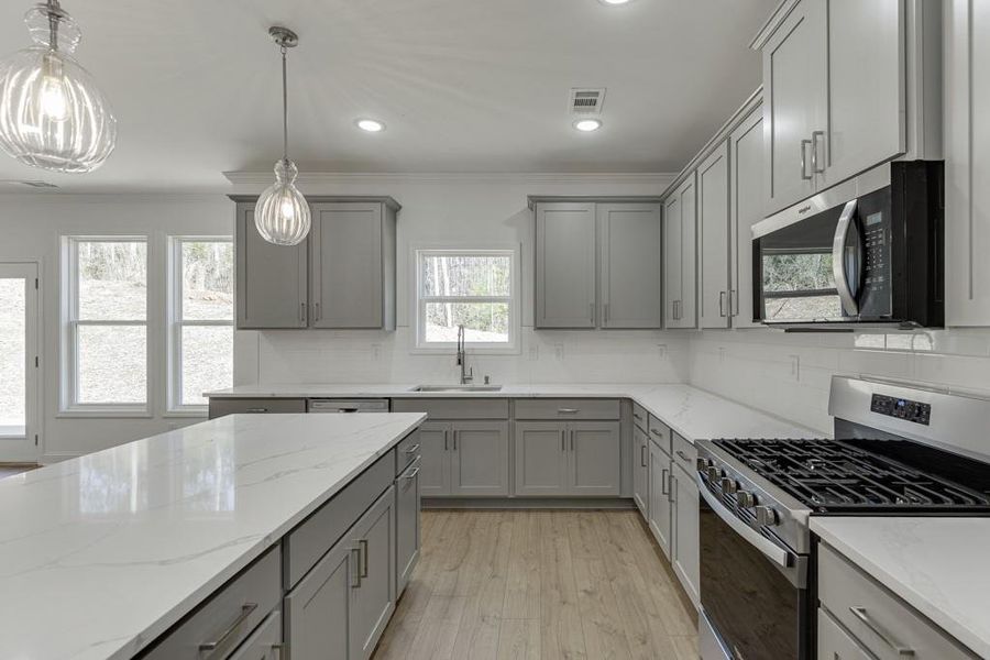 Furnished interior view inside a new home in , Commerce (Image 11).