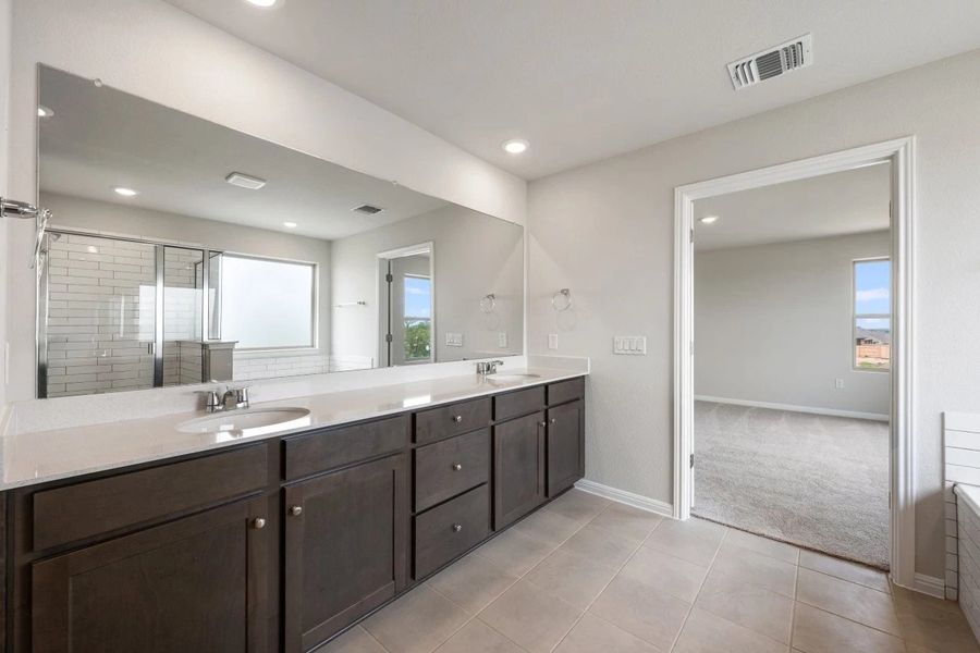 Furnished interior view inside a new home in The Colony, Bastrop (Image 11).
