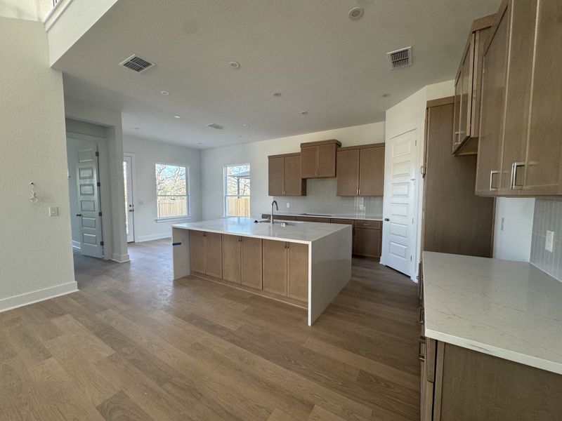 In-progress construction of a new home in Persimmon, Buda, TX (Image 8). In-progress construction of a new home in Persimmon, Buda, TX (Image 8).