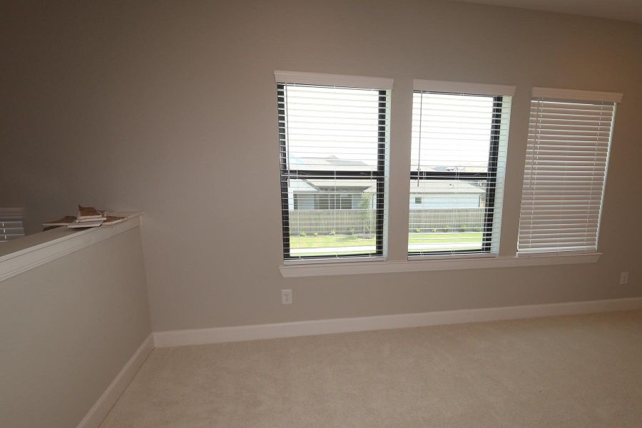 Spacious, unfurnished interior of a new home in Riceland - Enclave Row Collection, Mont Belvieu (Image 9). Spacious, unfurnished interior of a new home in Riceland - Enclave Row Collection, Mont Belvieu (Image 9).