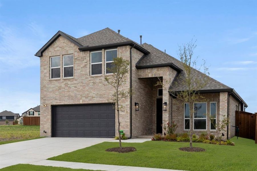 Front exterior of a new home in Las Lomas, Forney, TX, highlighting curb appeal (Image 19). Front exterior of a new home in Las Lomas, Forney, TX, highlighting curb appeal (Image 19).