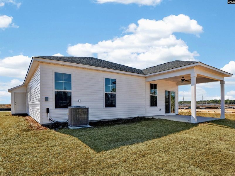Exterior details and patio area of a home in Old Charleston Acres, Pelion (Image 24).
