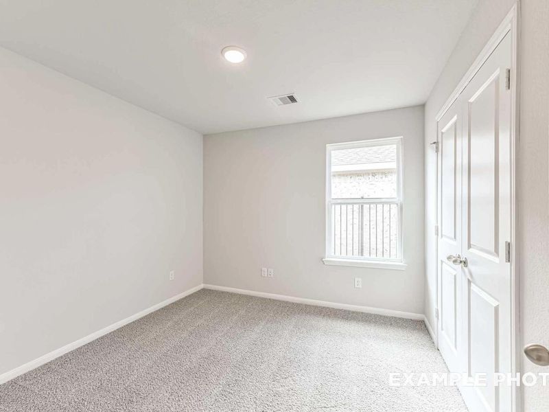Spacious, unfurnished interior of a new home in Sunterra, Katy (Image 20).