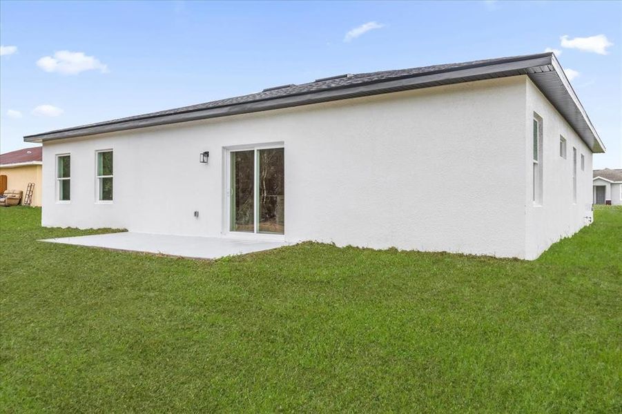 Exterior details and patio area of a home in , Ocala (Image 3).