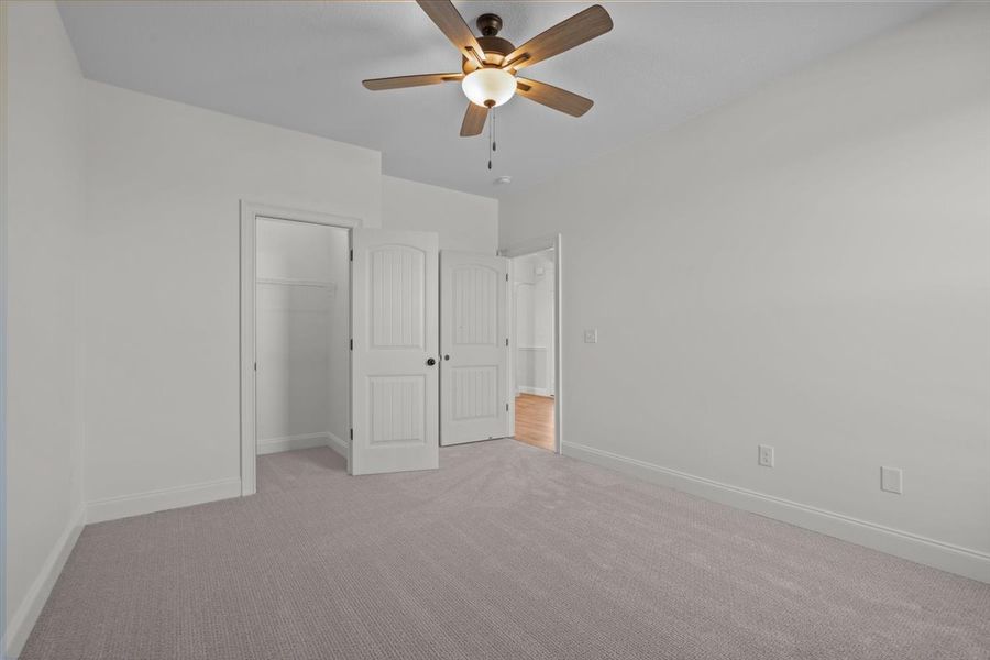 Representative unfurnished interior of a home built from the Converse by Enchanted Homes in Lonesome Dove, San Antonio (Image 42).