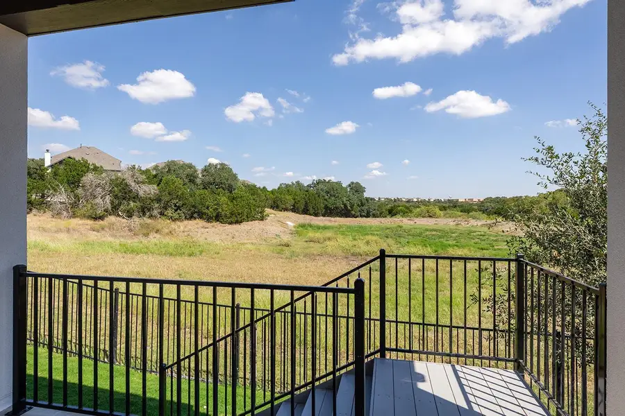 Exterior details and patio area of a home in Wolf Ranch South Fork, Georgetown (Image 4).