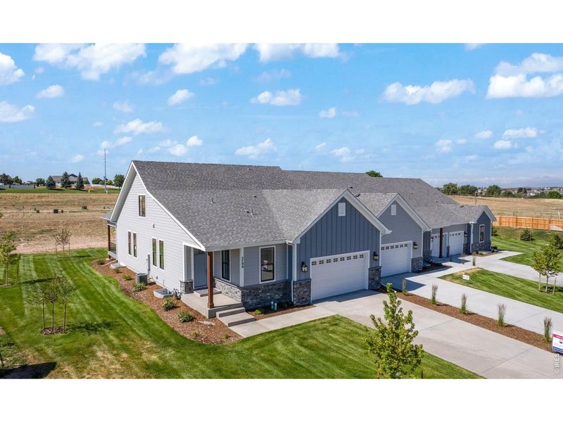Front exterior of a new home in , Greeley, CO, highlighting curb appeal (Image 26). Front exterior of a new home in , Greeley, CO, highlighting curb appeal (Image 26).