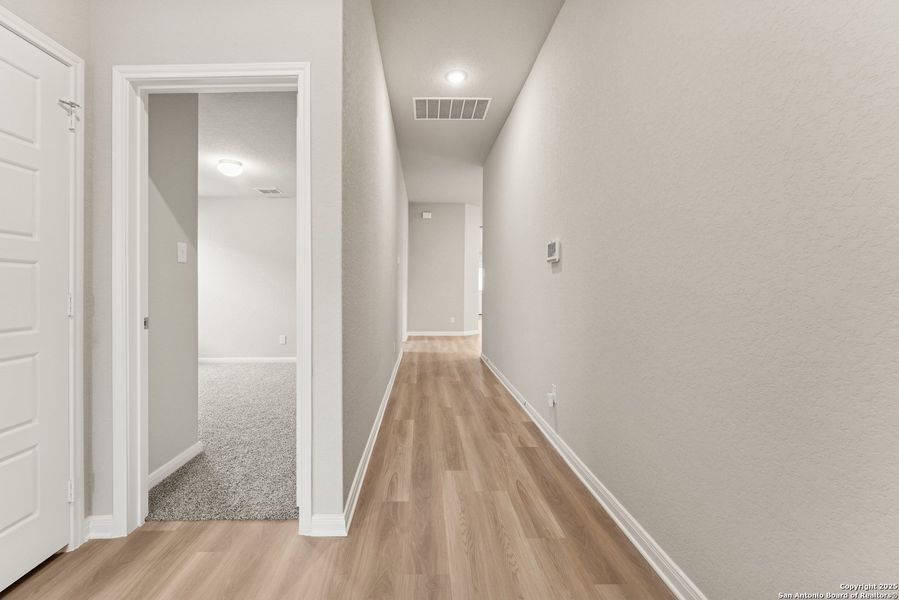 Spacious, unfurnished interior of a new home in Agave, San Antonio (Image 16). Spacious, unfurnished interior of a new home in Agave, San Antonio (Image 16).