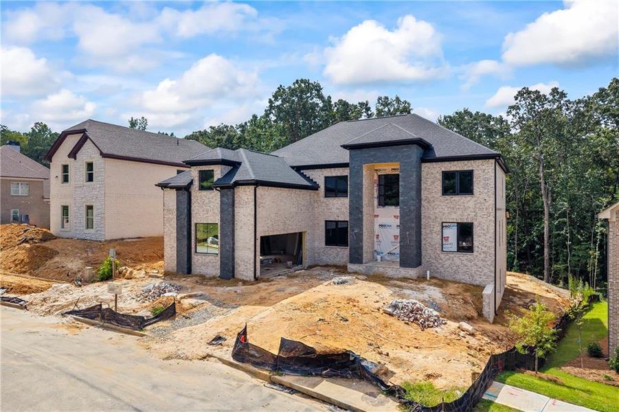 Front exterior of a new home in , Fairburn, GA, highlighting curb appeal (Image 24).