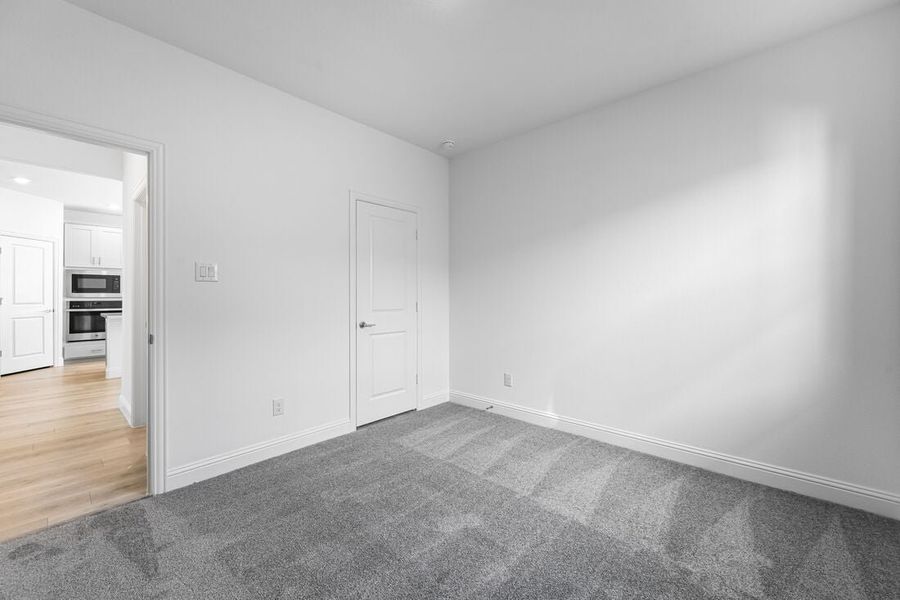 Representative unfurnished interior of a home built from the Lunaria by Taylor Morrison in Madero 50s, Fort Worth (Image 23).