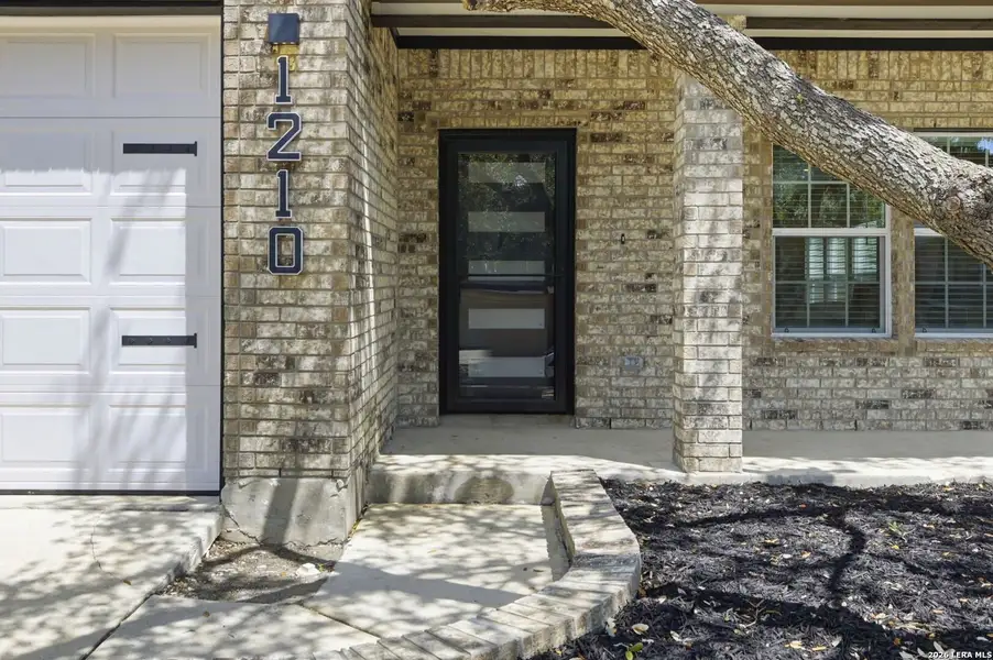 Exterior details and patio area of a home in , San Antonio (Image 20).