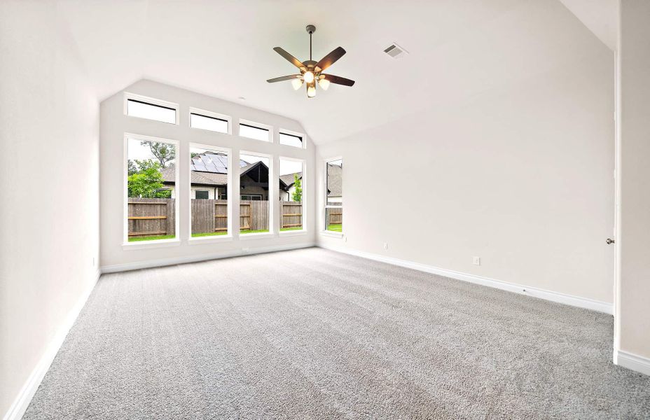Representative unfurnished interior of a home built from the 4094 by Ravenna Homes in Artavia 70′, Conroe (Image 52).