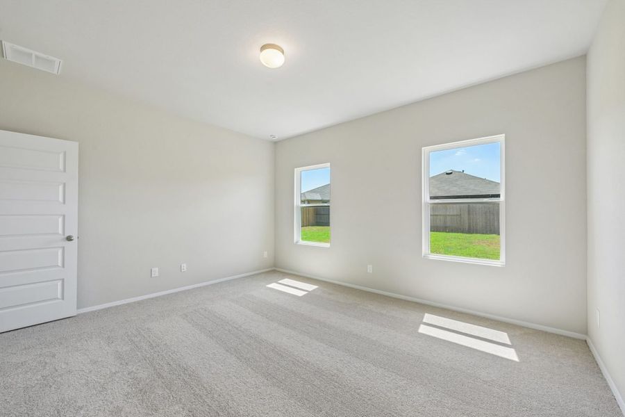 Spacious, unfurnished interior of a new home in Harrington Trails, New Caney (Image 21).