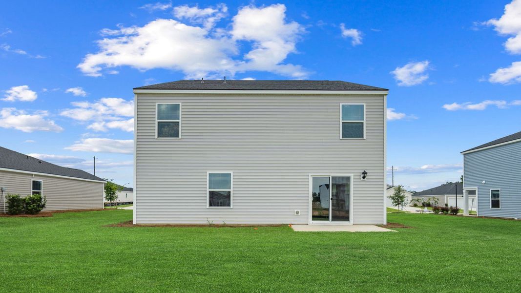 Exterior details and patio area of a home in The Groves at Bees Creek, Ridgeland (Image 2).