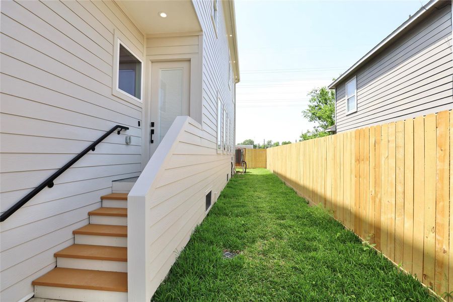 The front door has built-in blinds for added privacy. Notice the cedar-painted stair steps leading to the entryway, where the landing is finished with ALX waterproofing for durability and style. The front door has built-in blinds for added privacy. Notice the cedar-painted stair steps leading to the entryway, where the landing is finished with ALX waterproofing for durability and style.