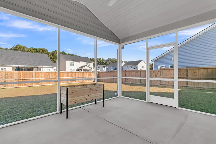 Exterior details and patio area of a home in Sweetgrass at Summers Corner: Arbor Collection, Summerville (Image 2). Exterior details and patio area of a home in Sweetgrass at Summers Corner: Arbor Collection, Summerville (Image 2).