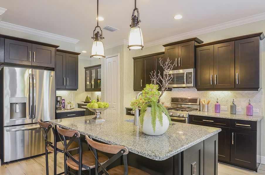 Representative furnished interior of a home built from the White Star by Neal Communities in SkySail, Naples (Image 18).