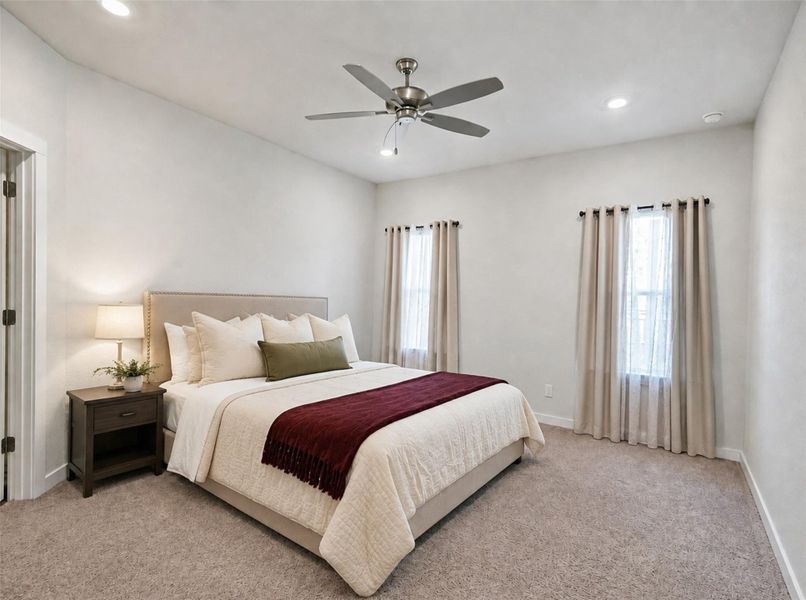 Soft carpeting pairs with recessed lighting to create a serene, restful atmosphere. Soft carpeting pairs with recessed lighting to create a serene, restful atmosphere.