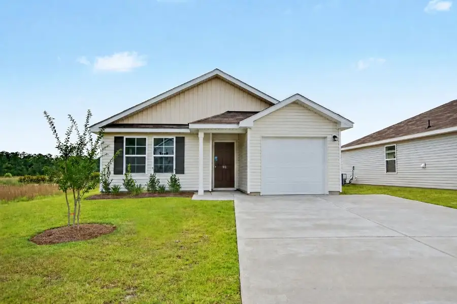 Front exterior of a new home in Cottonwood Place, Tabor City, NC, highlighting curb appeal (Image 1). Front exterior of a new home in Cottonwood Place, Tabor City, NC, highlighting curb appeal (Image 1).