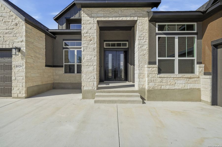Exterior details and patio area of a home in Heimer Estates at Garden Ridge, San Antonio (Image 31).