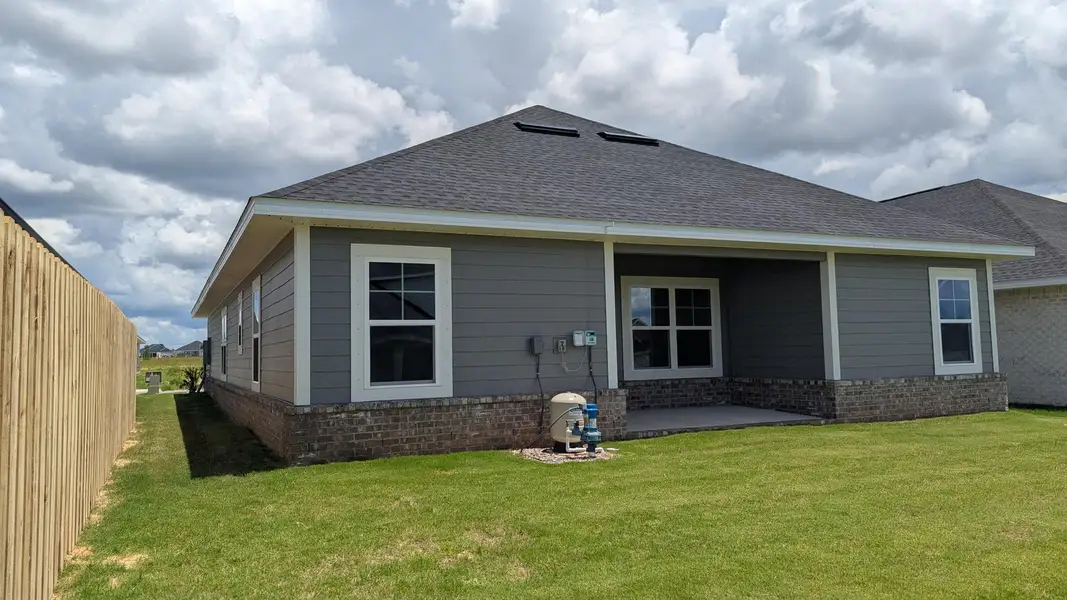 Exterior details and patio area of a home in The Bluffs at Lafayette, Freeport (Image 4).