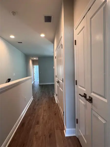 Spacious, unfurnished interior of a new home in The Towns At Long Bayou, Seminole (Image 18).