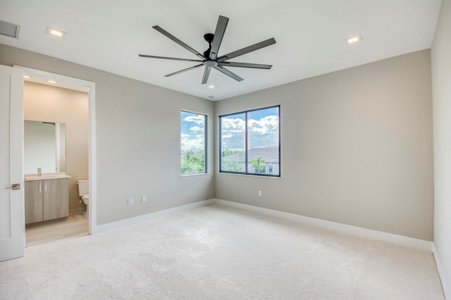 Exterior details and patio area of a home in Apex at Avenir, Palm Beach Gardens (Image 26).