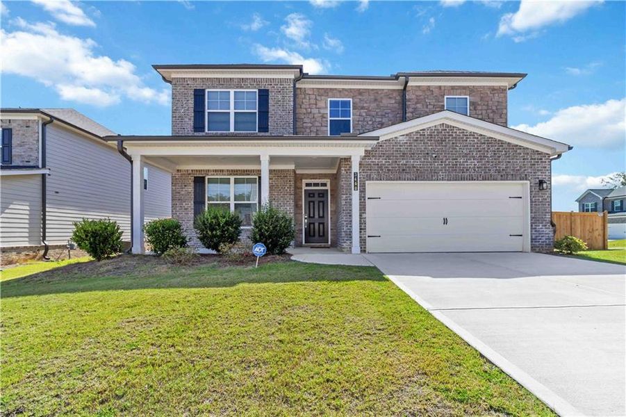 Front exterior of a new home in , Atlanta, GA, highlighting curb appeal (Image 23).
