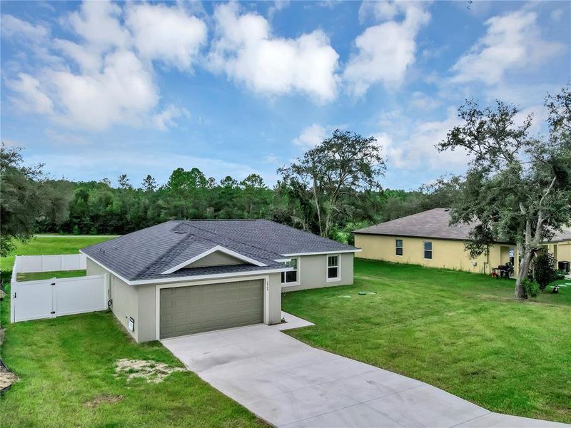 Front exterior of a new home in , Citrus Springs, FL, highlighting curb appeal (Image 10). Front exterior of a new home in , Citrus Springs, FL, highlighting curb appeal (Image 10).
