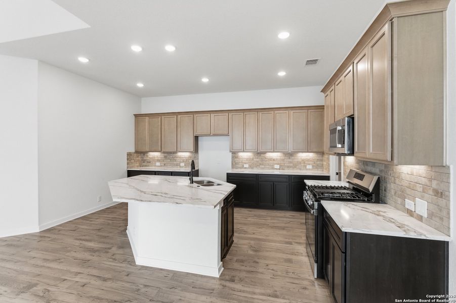 Furnished interior view inside a new home in The Crossvine – Garden Homes, Schertz (Image 6).